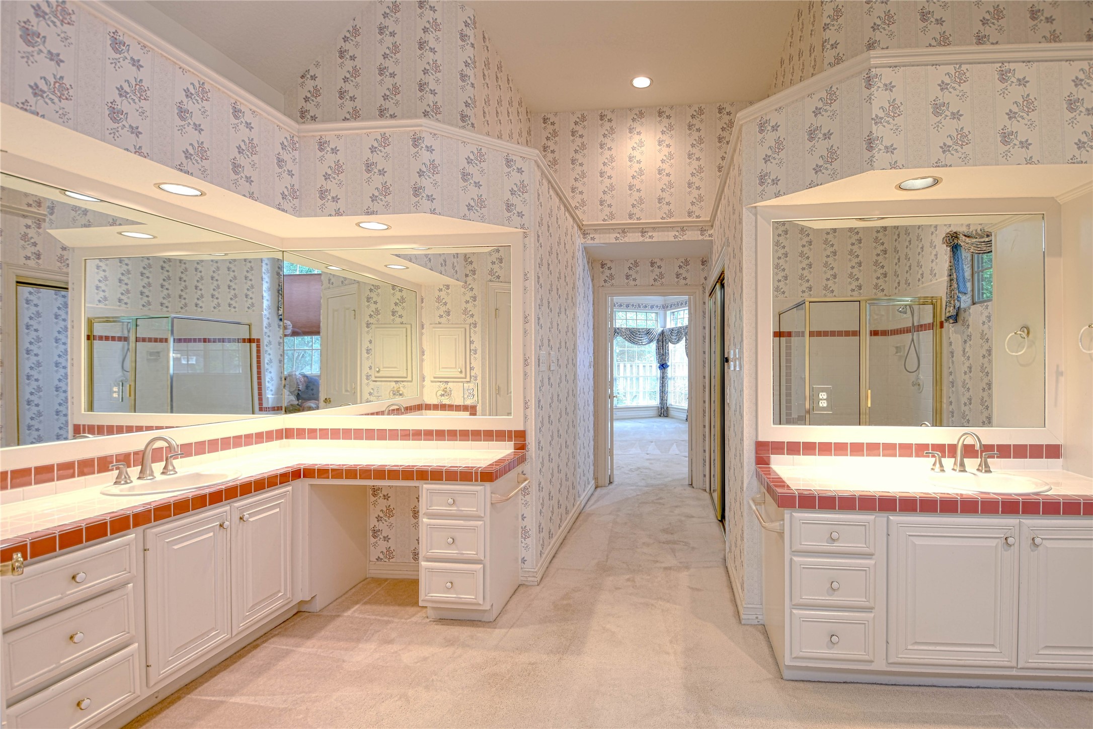 2 Woodmere Place Spring, TX 77381 - Photo 13 of 20 a spacious bathroom with a granite countertop sink and a large mirror