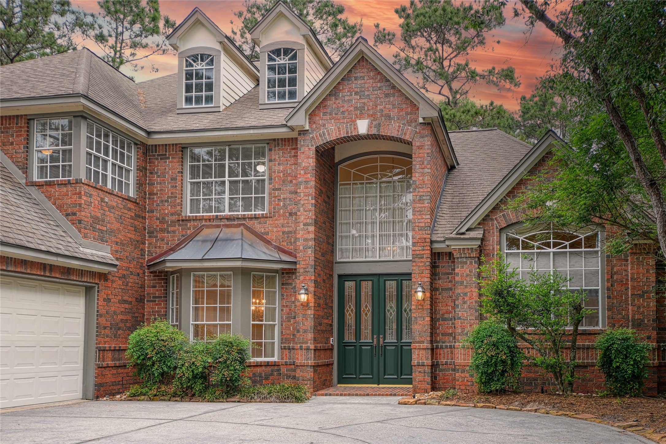 2 Woodmere Place Spring, TX 77381 - Photo 20 of 20 a front view of a house with a yard