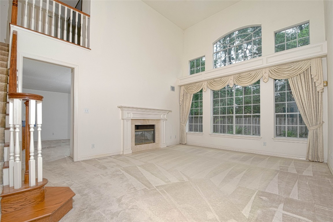 2 Woodmere Place Spring, TX 77381 - Photo 7 of 20 a view of an empty room with a window