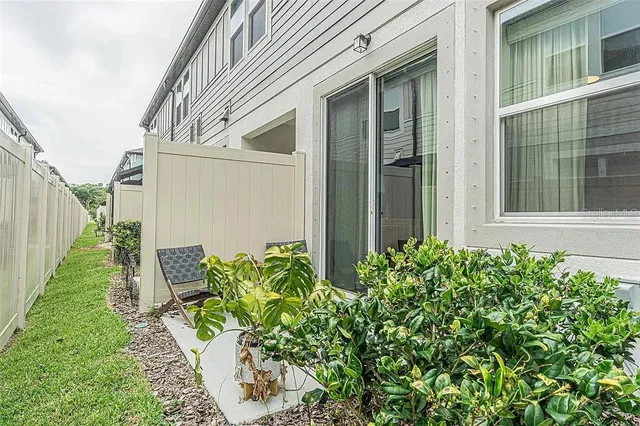 a view of a back yard of the house