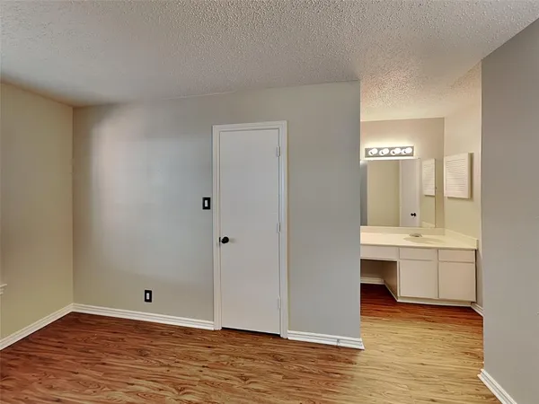 a view of bathroom with bathtub shower and a sink