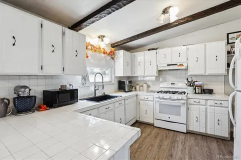 $574,490 | 7904 Hillcrest Drive, Louviers, CO 80131