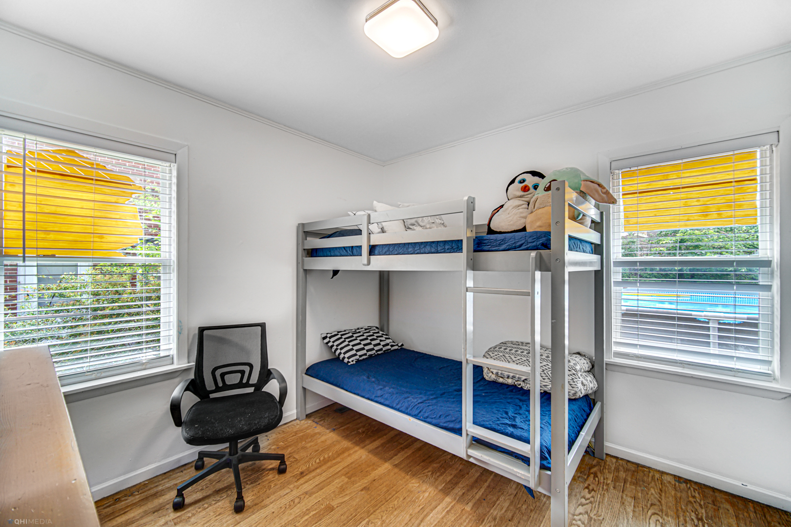 5049 Butterfield Road Hillside, IL 60162 - Photo 8 of 17 a bedroom with a bed and a window
