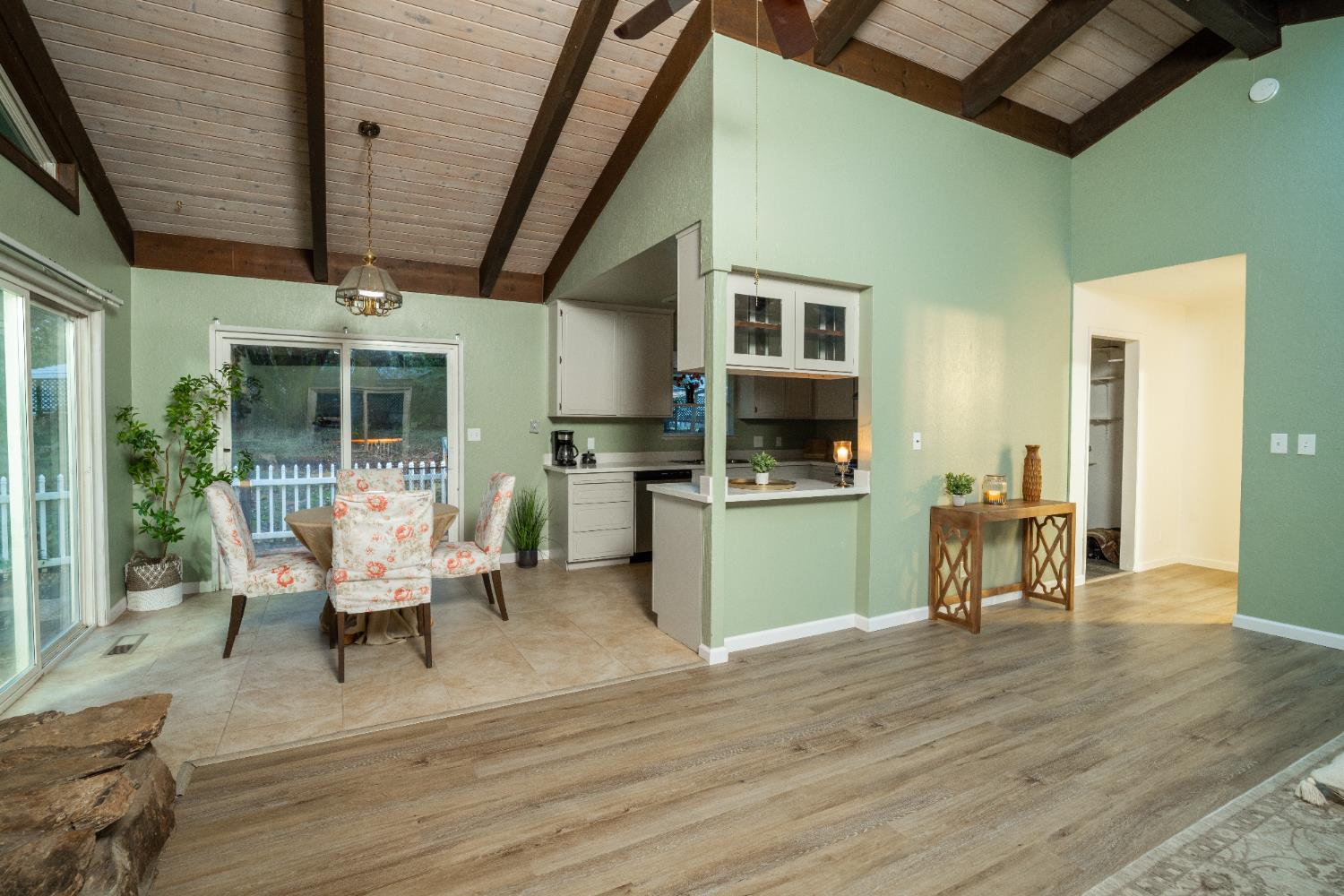 6100 Shasta Road Garden Valley, CA 95633 - Photo 14 of 39 a living room with furniture and a wooden floor