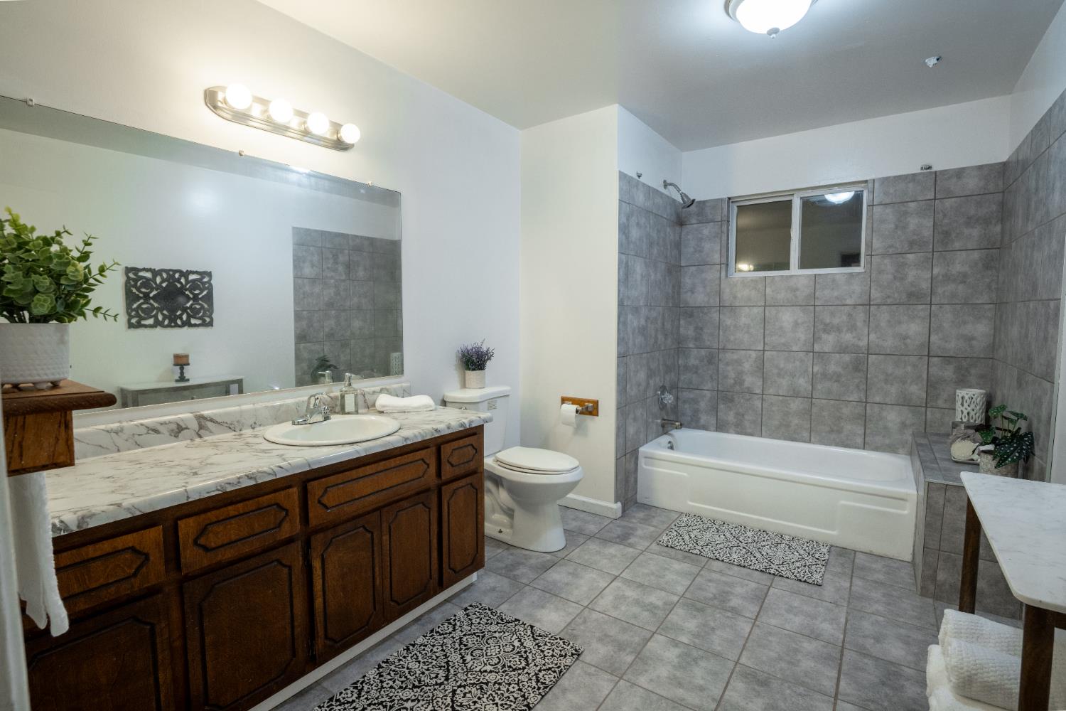 6100 Shasta Road Garden Valley, CA 95633 - Photo 20 of 39 a bathroom with a sink a toilet and bathtub