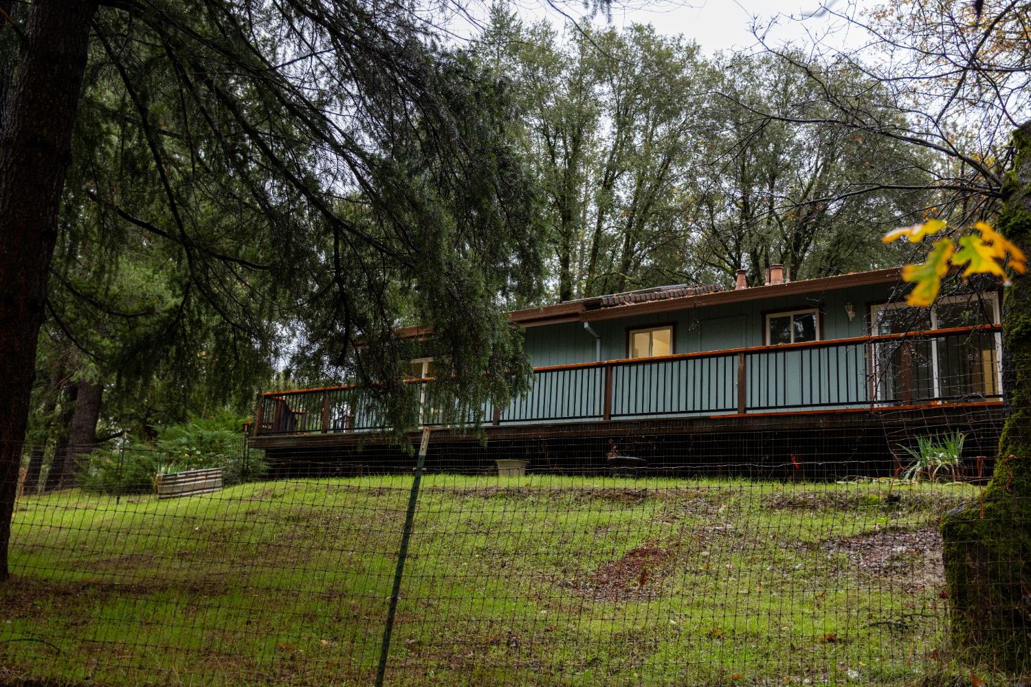 6100 Shasta Road Garden Valley, CA 95633 - Photo 39 of 39 a front view of a house with garden