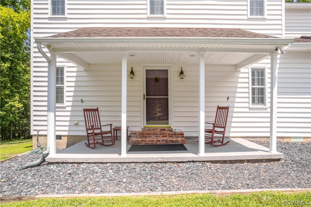 858 Chapel Road New Canton, VA 23123 - Photo 12 of 48 a view of house with backyard and sitting area