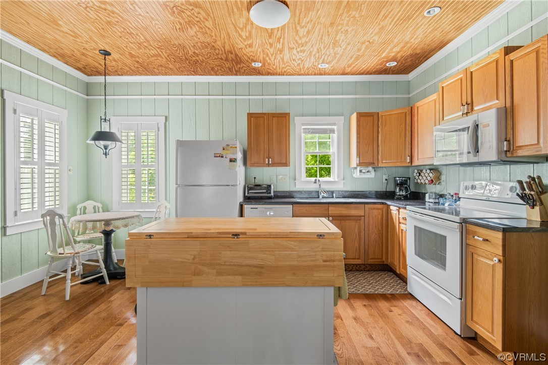 858 Chapel Road New Canton, VA 23123 - Photo 20 of 48 a kitchen with stainless steel appliances granite countertop a sink and a refrigerator