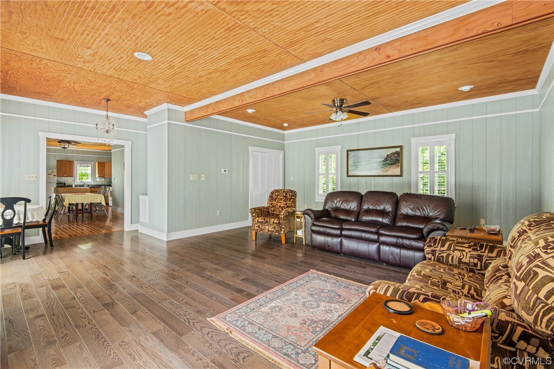 858 Chapel Road New Canton, VA 23123 - Photo 26 of 48 a living room with furniture and a wooden floor