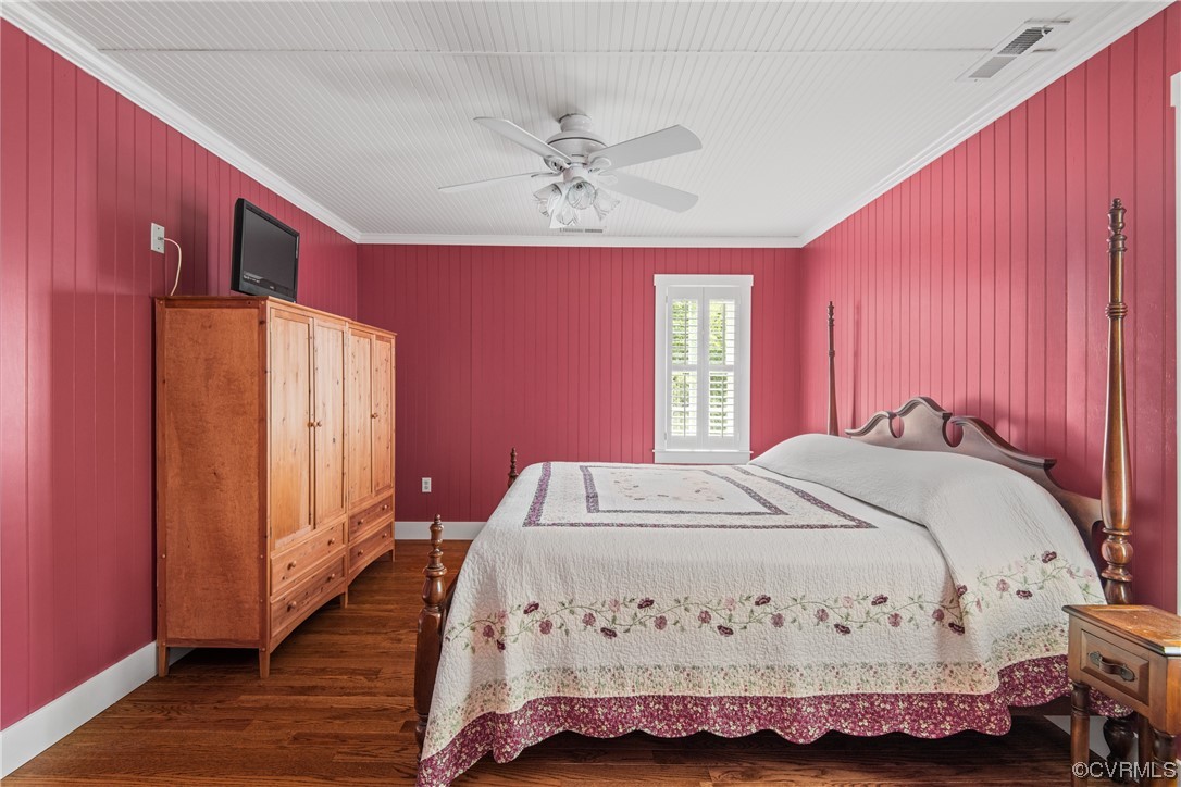 858 Chapel Road New Canton, VA 23123 - Photo 38 of 48 a bed sitting in a spacious bedroom next to a window