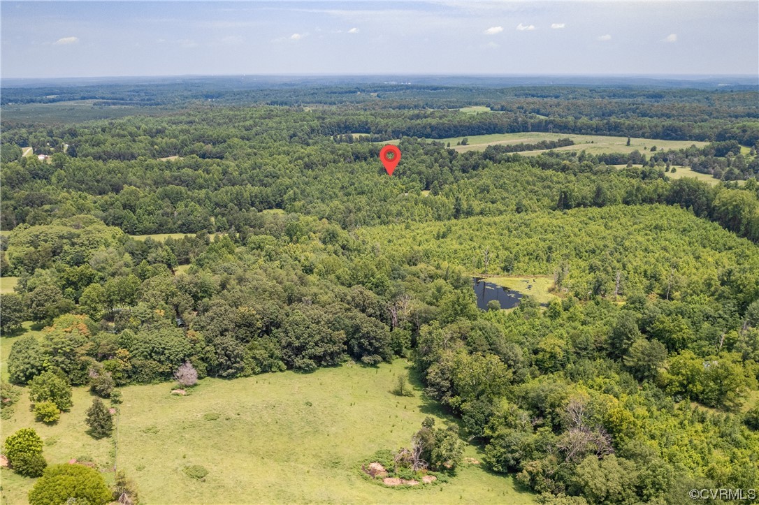 858 Chapel Road New Canton, VA 23123 - Photo 43 of 48 a view of a field with an ocean and mountain view