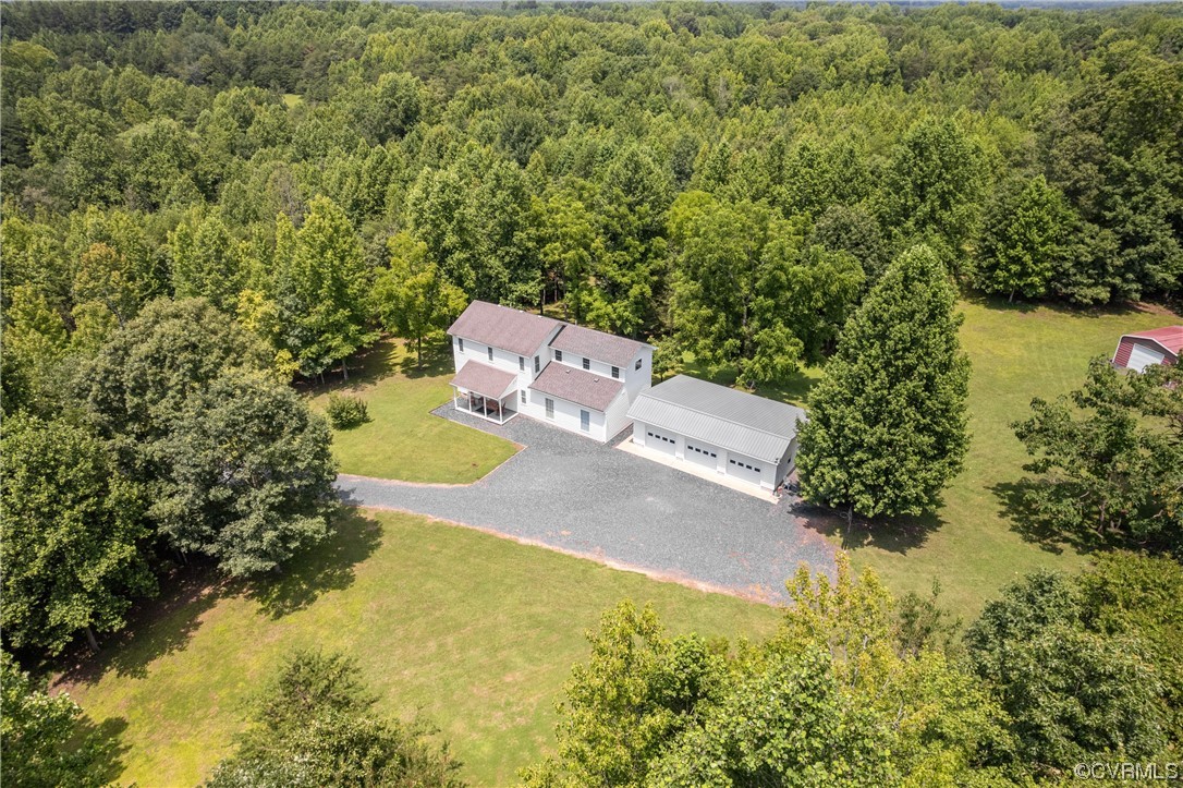 858 Chapel Road New Canton, VA 23123 - Photo 46 of 48 an aerial view of a house with a yard and lake view