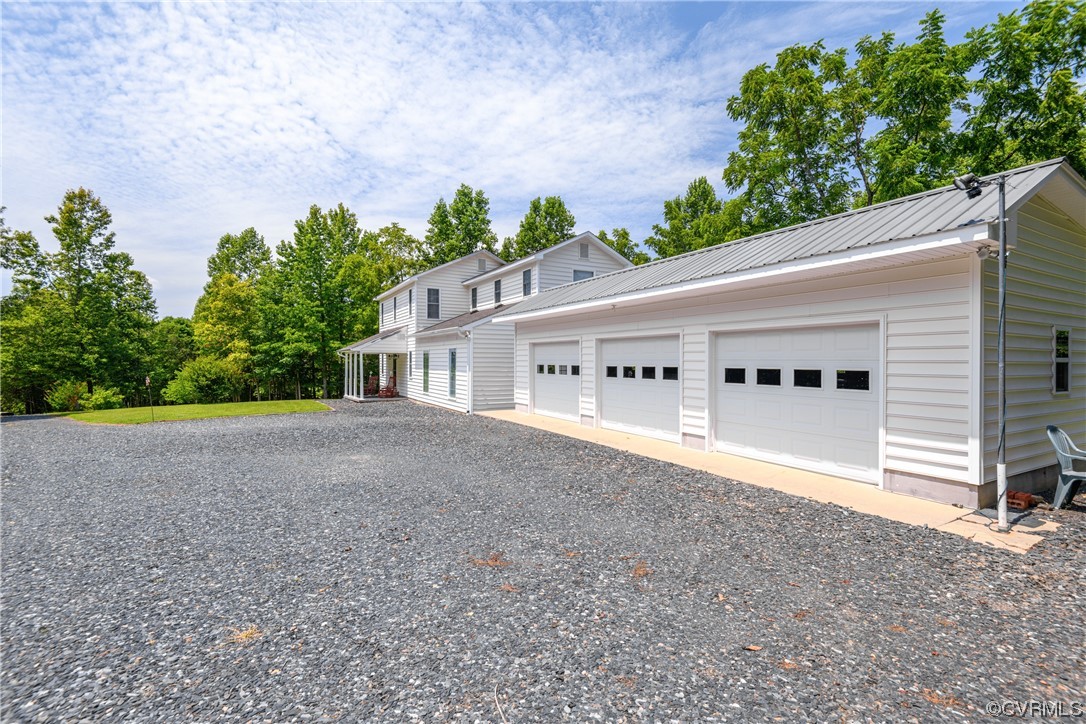 858 Chapel Road New Canton, VA 23123 - Photo 6 of 48 a view of house with outdoor space and trees in the background