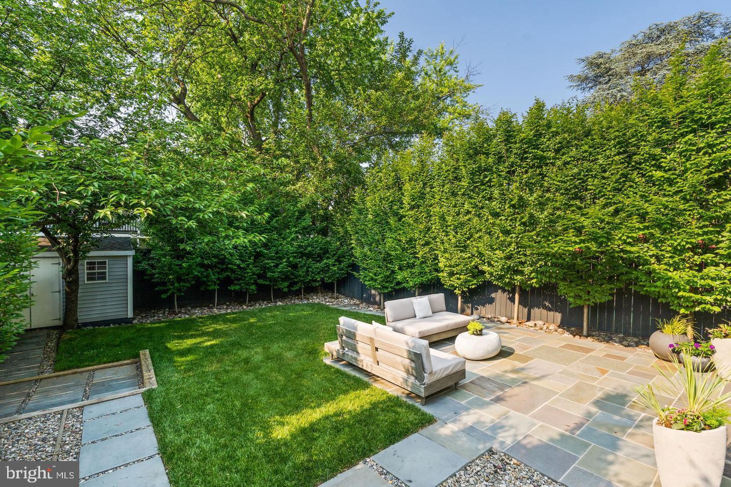 3417 R Street Northwest Washington, DC 20007 - Photo 11 of 29 Large lawn area with perimeter mature trees