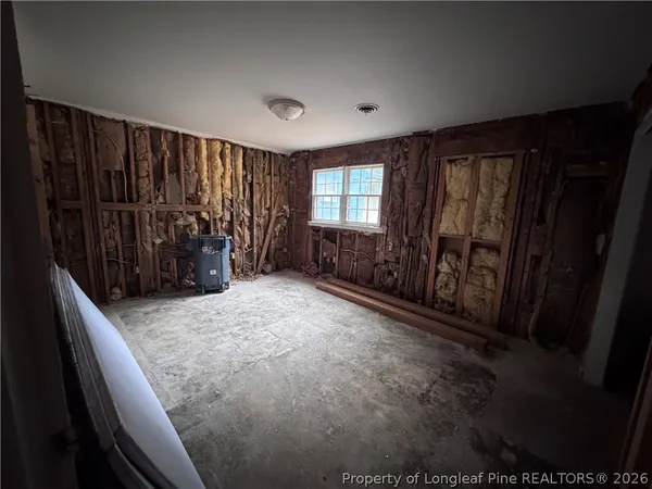 a view of livingroom with furniture wooden floor and window