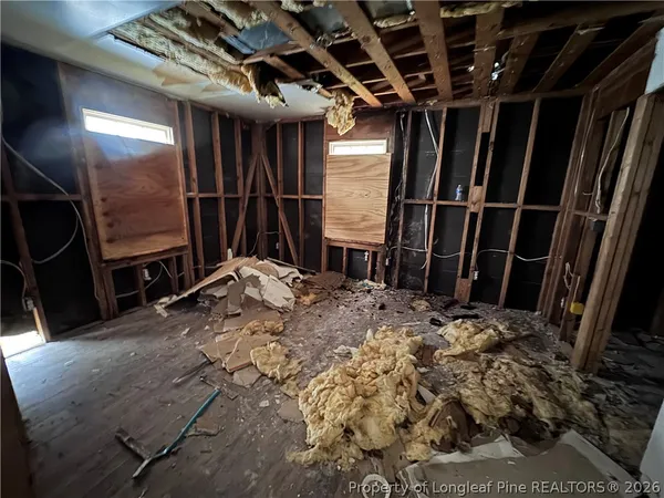 a view of a livingroom with a staircase