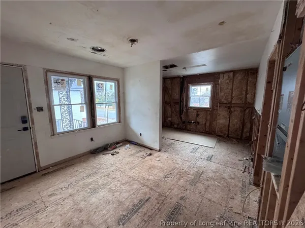 a view of a livingroom with wooden floor