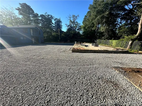 a view of a yard with tiny house