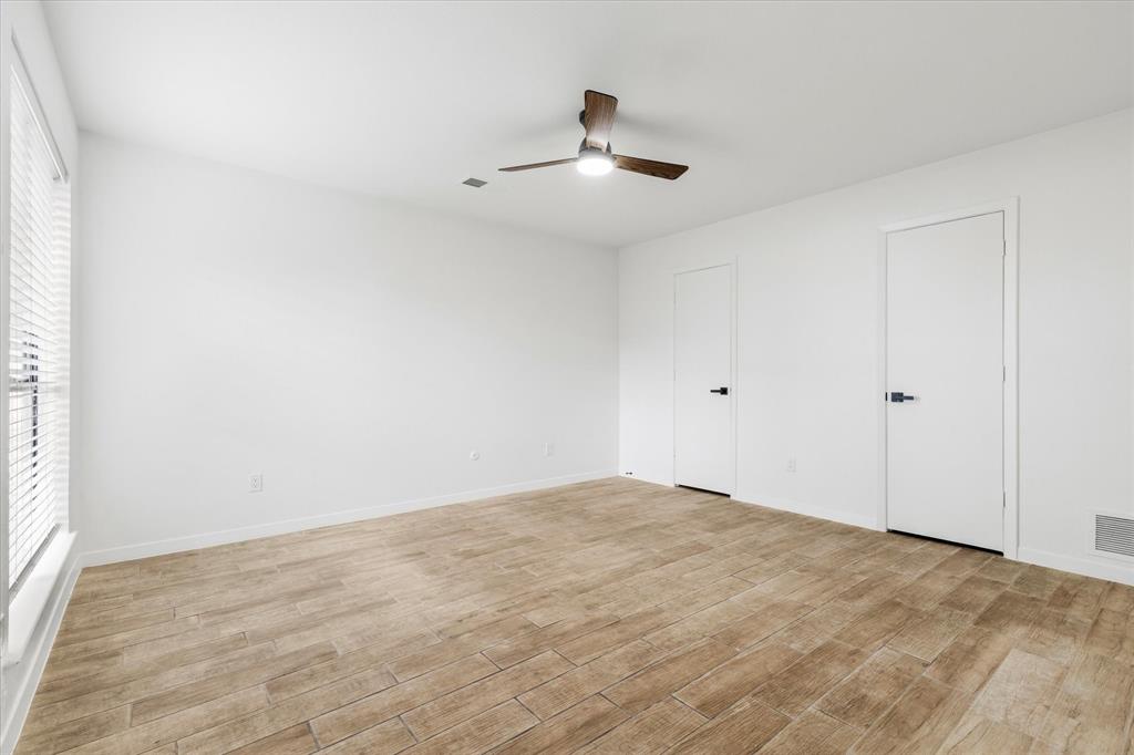 17003 Davenport Road Dallas, TX 75248 - Photo 34 of 40 wooden floor in an empty room