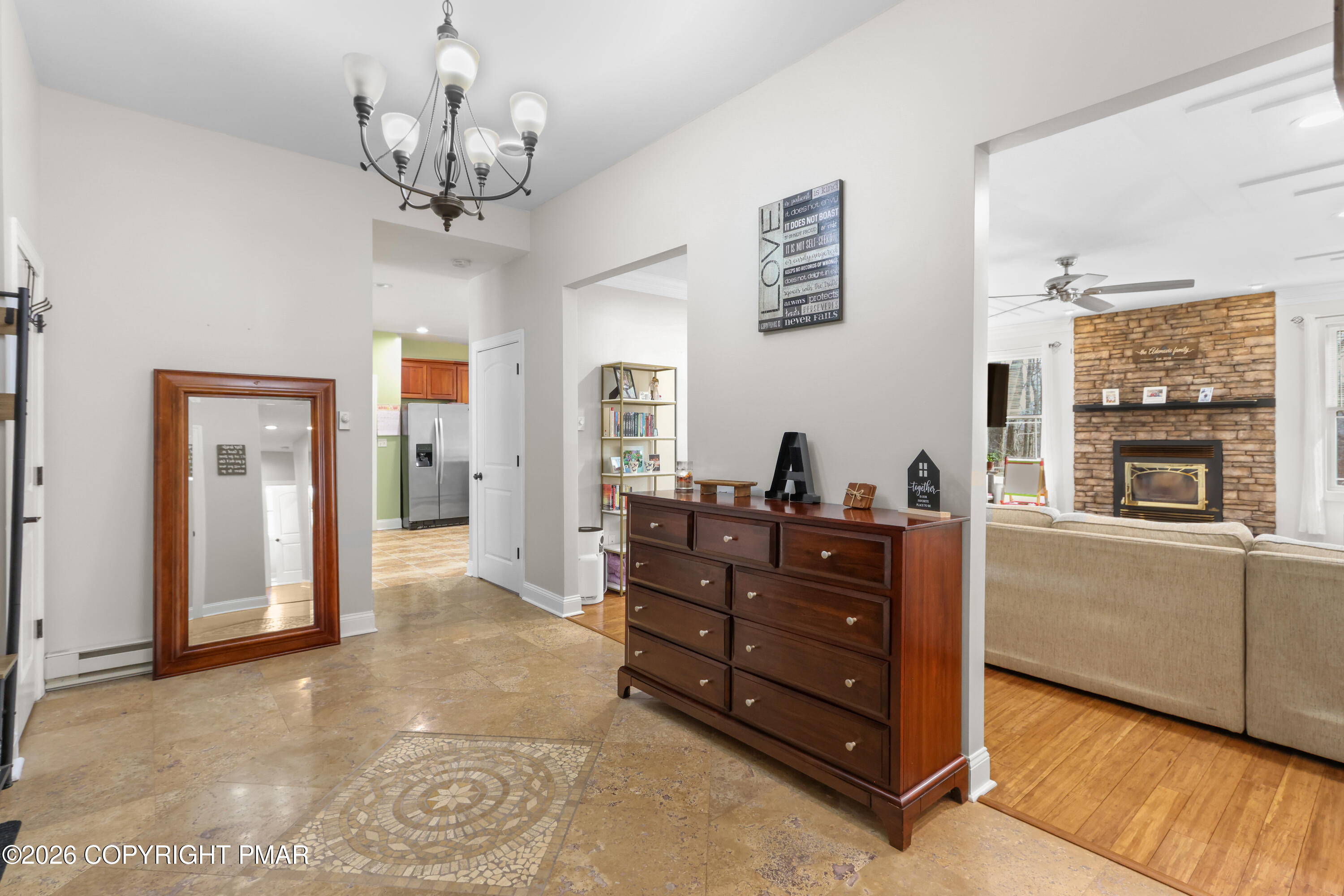 1007 Hampstead Road Bushkill, PA 18324 - Photo 5 of 68 a bed room with a bed and a chandelier