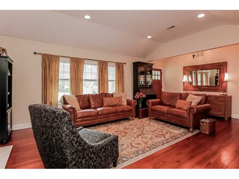 5 Archer Lane Darien, CT 06820 - Photo 2 of 17 a living room with furniture and a flat screen tv