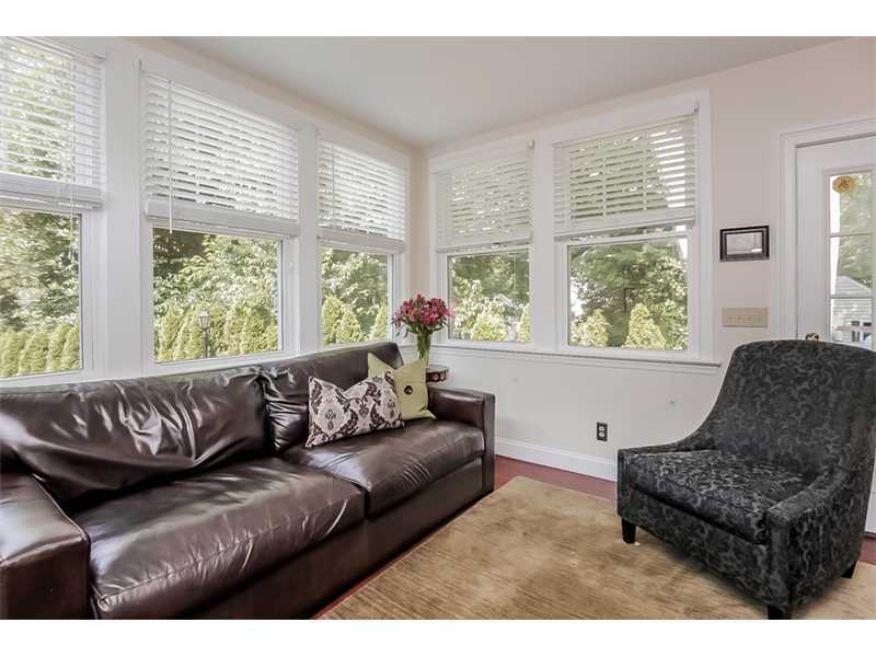 5 Archer Lane Darien, CT 06820 - Photo 5 of 17 a living room with furniture and a large window