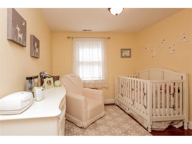 5 Archer Lane Darien, CT 06820 - Photo 9 of 17 a living room with furniture and a table