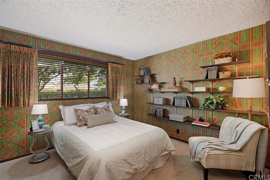 625 Rosemarie Drive Arcadia, CA 91007 - Photo 18 of 35 a bedroom with a bed and wooden floor