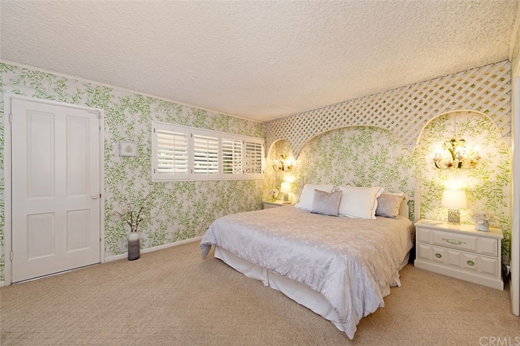 625 Rosemarie Drive Arcadia, CA 91007 - Photo 21 of 35 a spacious bedroom with a bed and a window