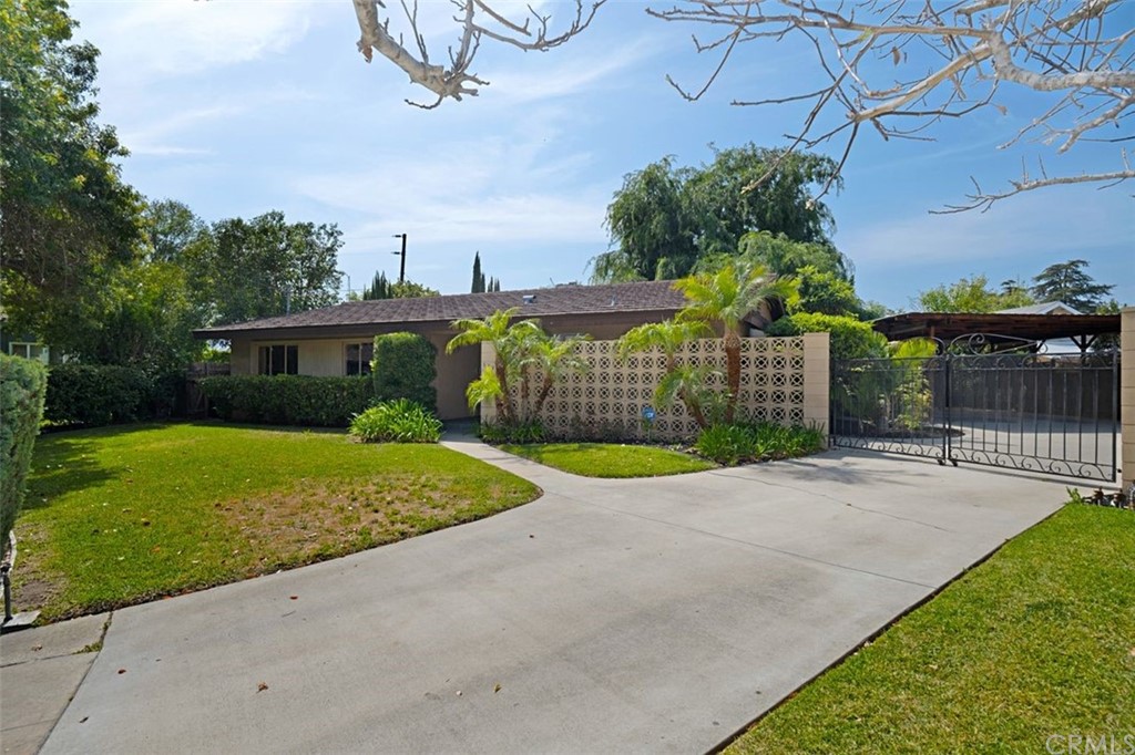 625 Rosemarie Drive Arcadia, CA 91007 - Photo 35 of 35 a view of a house with a yard and potted plants
