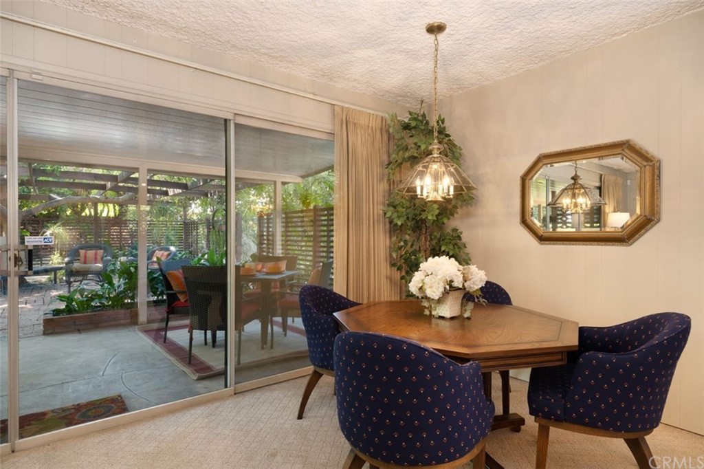 625 Rosemarie Drive Arcadia, CA 91007 - Photo 10 of 35 a dining room with furniture a chandelier and window