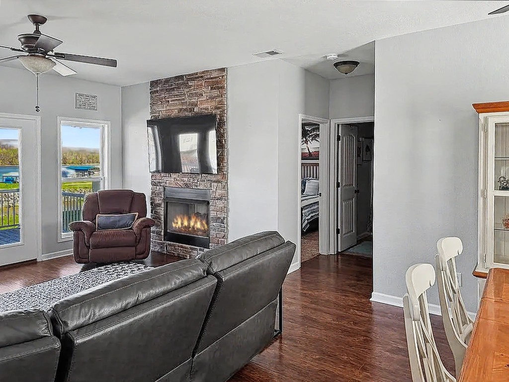 175 Ellen Lane Decaturville, TN 38329 - Photo 17 of 25 a living room with furniture and a fireplace