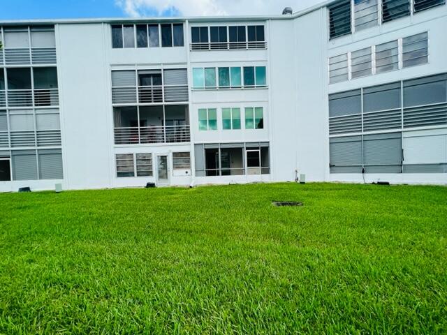 1006 Rexford Drive Boca Raton, FL 33434 - Photo 13 of 15 Rear view of building