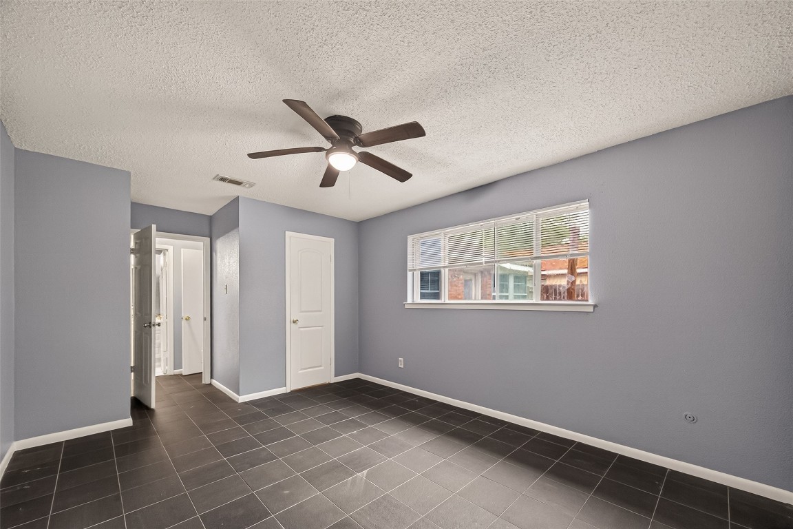 16219 Rill Lane Houston, TX 77062 - Photo 14 of 24 Secondary bedroom w walk in closet