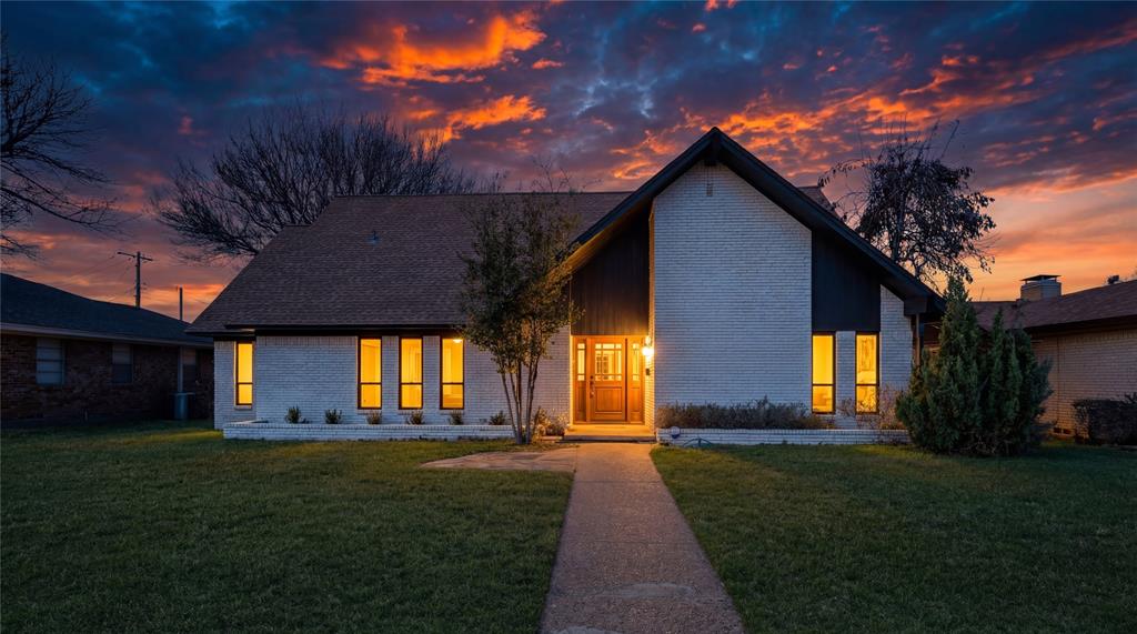 a house view with a garden space