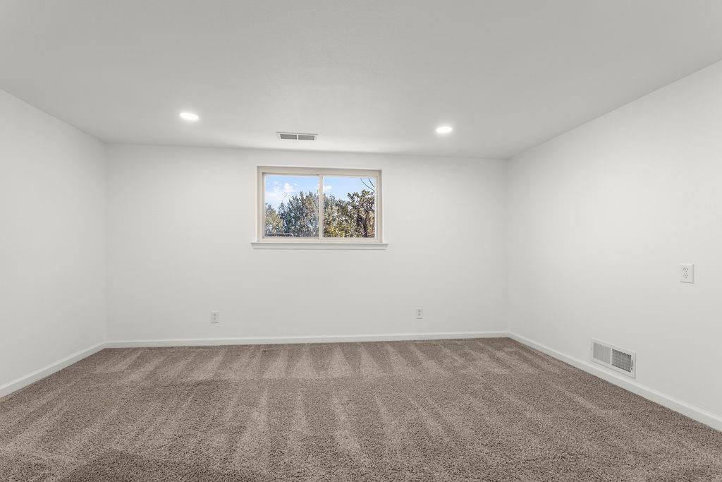 11022 Ferndale Road Dallas, TX 75238 - Photo 21 of 37 an empty room with a window