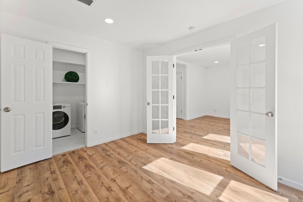 11022 Ferndale Road Dallas, TX 75238 - Photo 24 of 37 a view of a bedroom with a bathroom