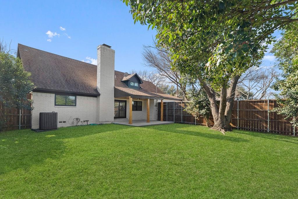 11022 Ferndale Road Dallas, TX 75238 - Photo 35 of 37 a view of a yard in front of a house