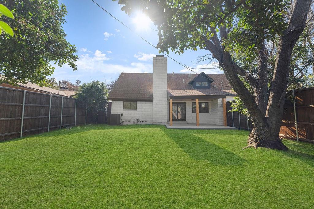 11022 Ferndale Road Dallas, TX 75238 - Photo 36 of 37 a view of a house with a yard