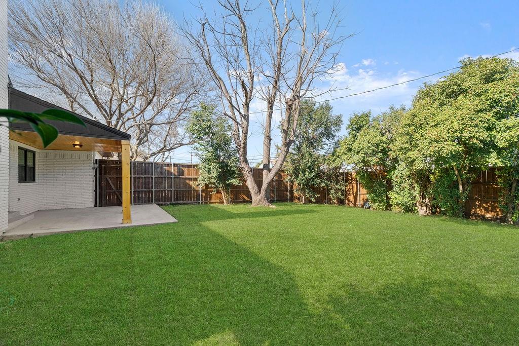 11022 Ferndale Road Dallas, TX 75238 - Photo 37 of 37 a view of a backyard with large trees