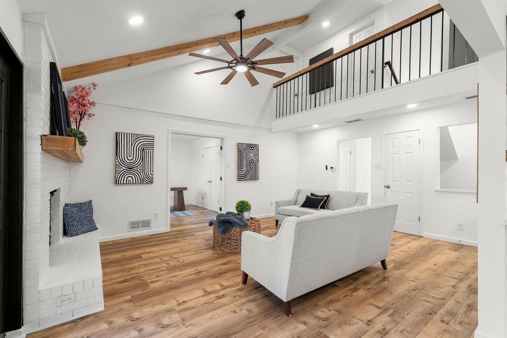11022 Ferndale Road Dallas, TX 75238 - Photo 5 of 37 a living room with furniture and a chandelier