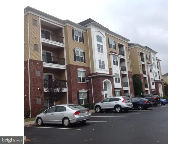 a car parked in front of a building