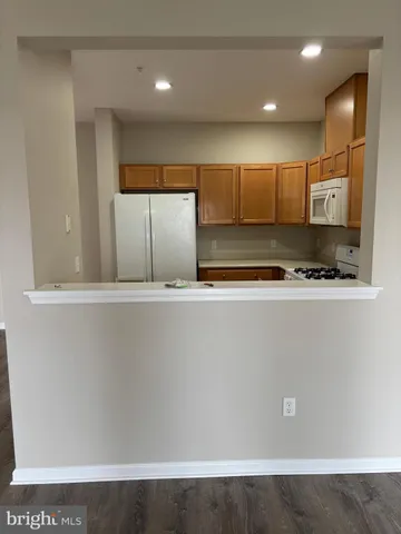 a view of kitchen with stainless steel appliances