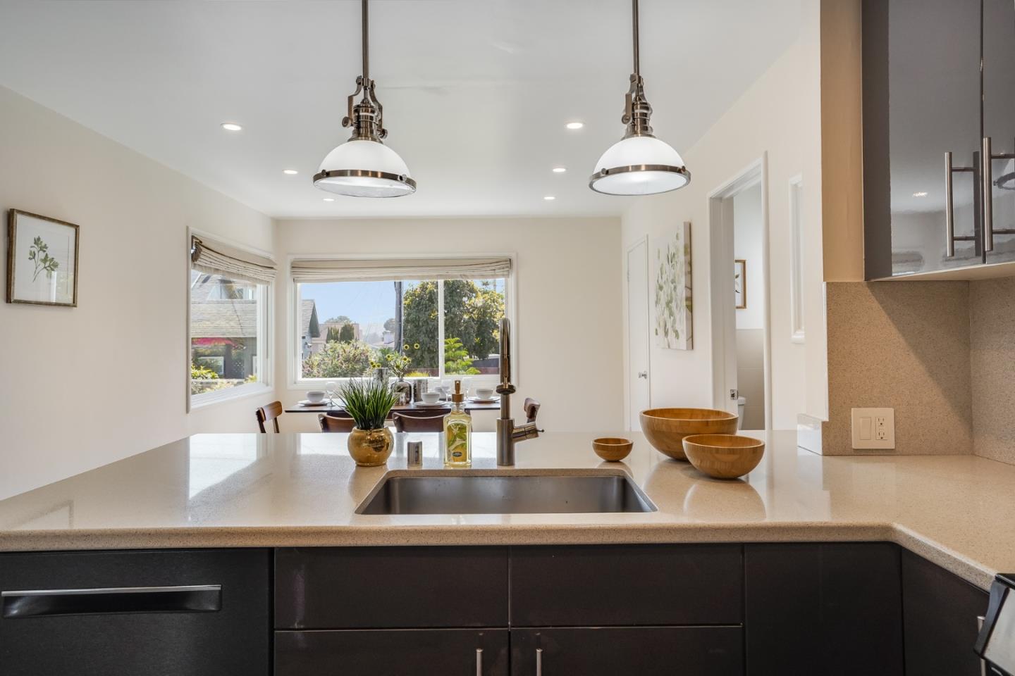 49 Sheffield Drive Daly City, CA 94015 - Photo 21 of 55 a dining room with wooden floor and large windows