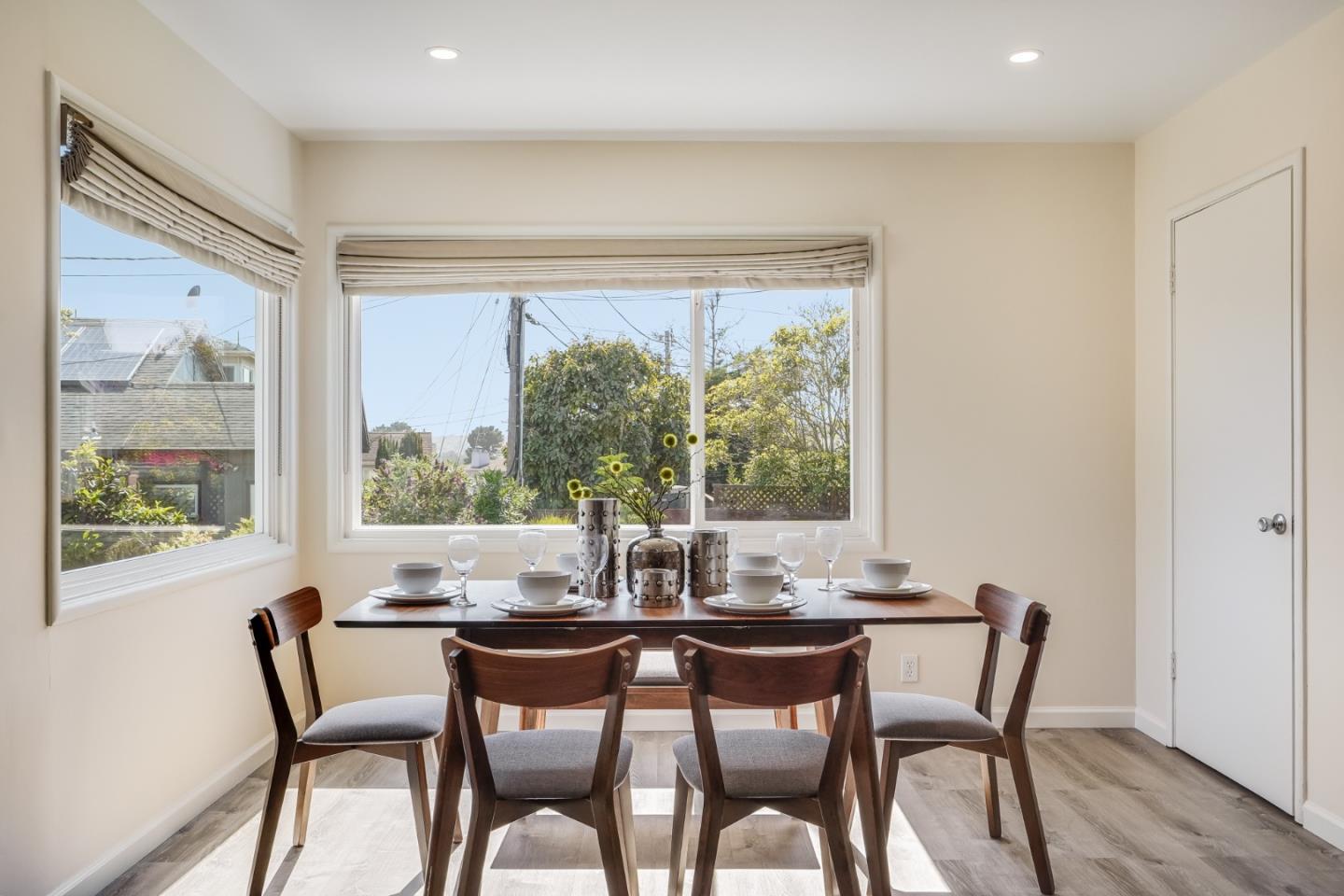 49 Sheffield Drive Daly City, CA 94015 - Photo 22 of 55 a dining room with furniture a chandelier and wooden floor
