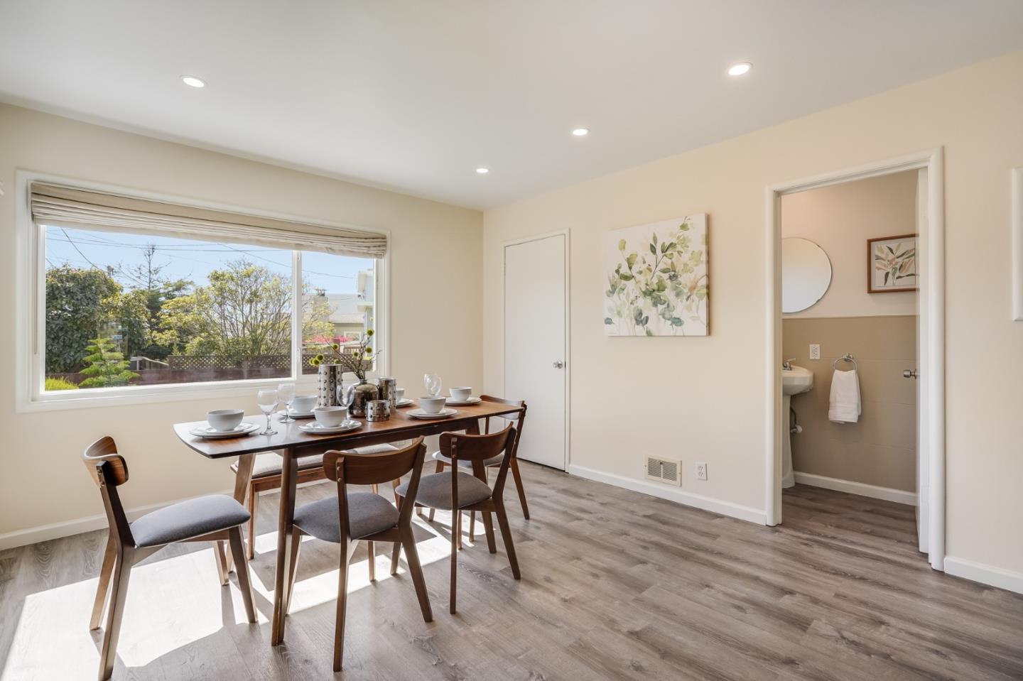 49 Sheffield Drive Daly City, CA 94015 - Photo 23 of 55 a view of a dining room with furniture window and wooden floor