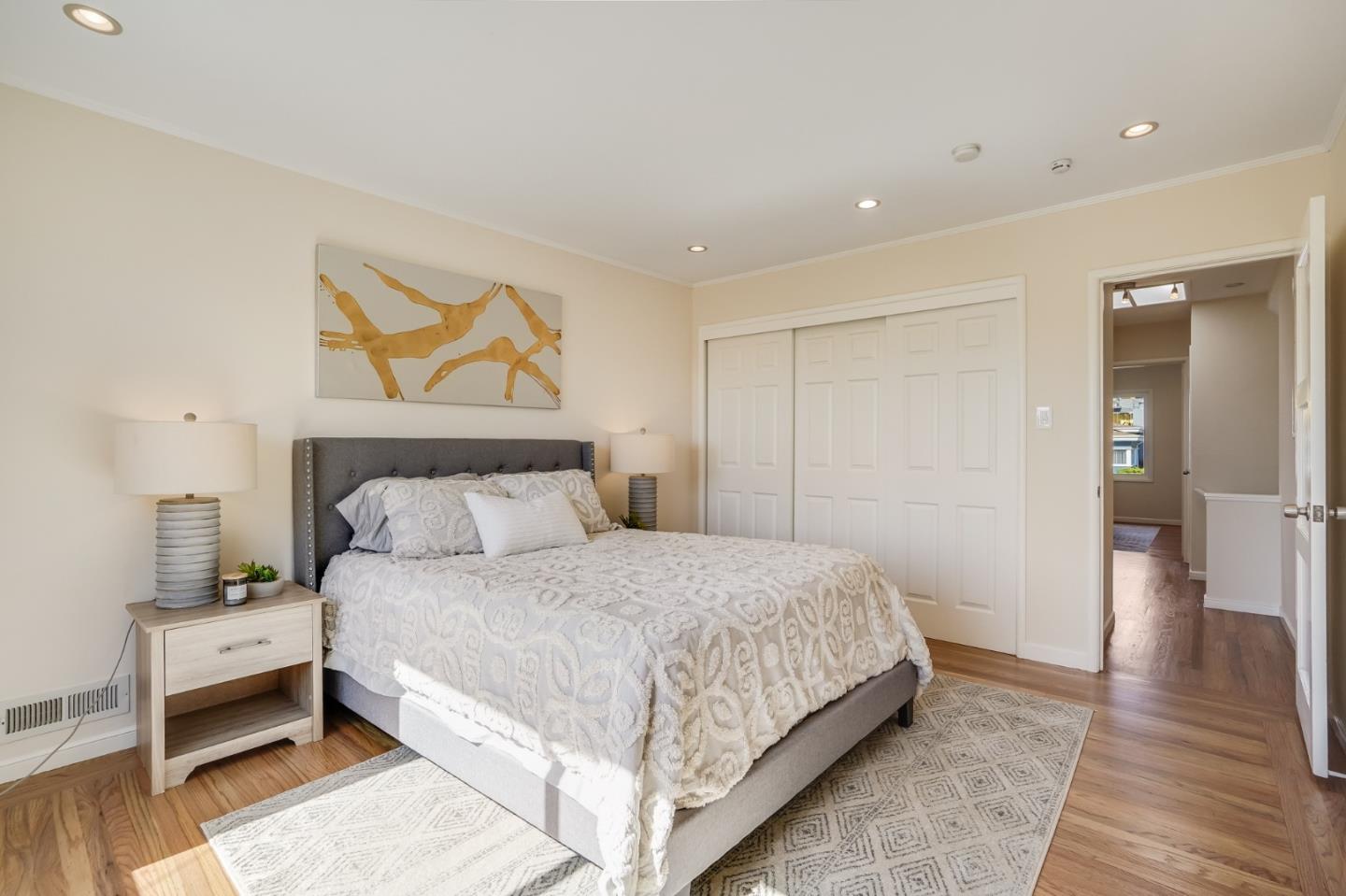 49 Sheffield Drive Daly City, CA 94015 - Photo 28 of 55 a bedroom with a bed and wooden floor