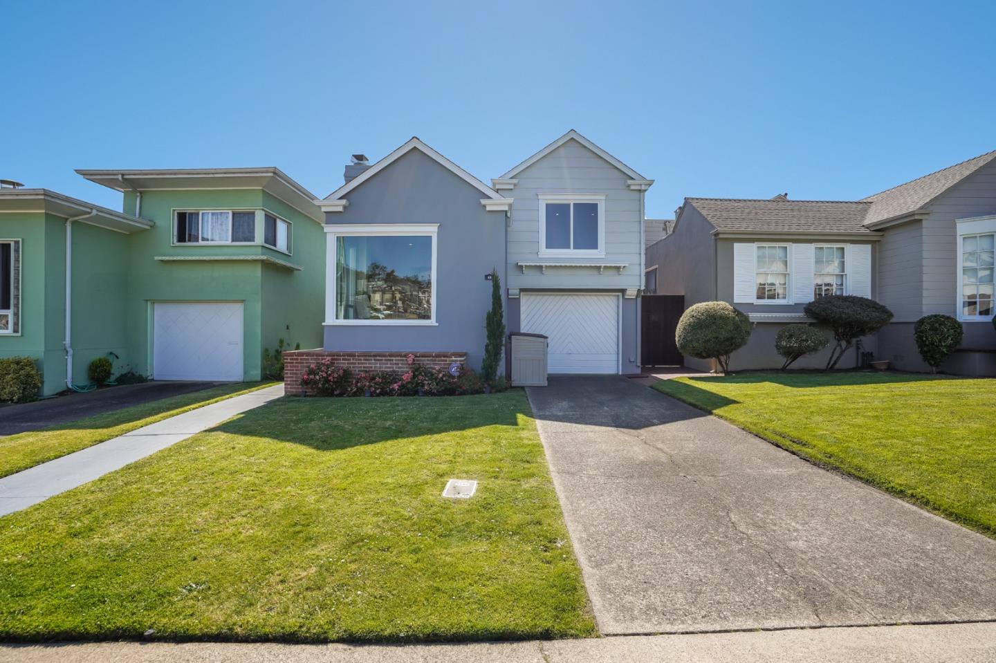 49 Sheffield Drive Daly City, CA 94015 - Photo 3 of 55 a front view of a house with garden