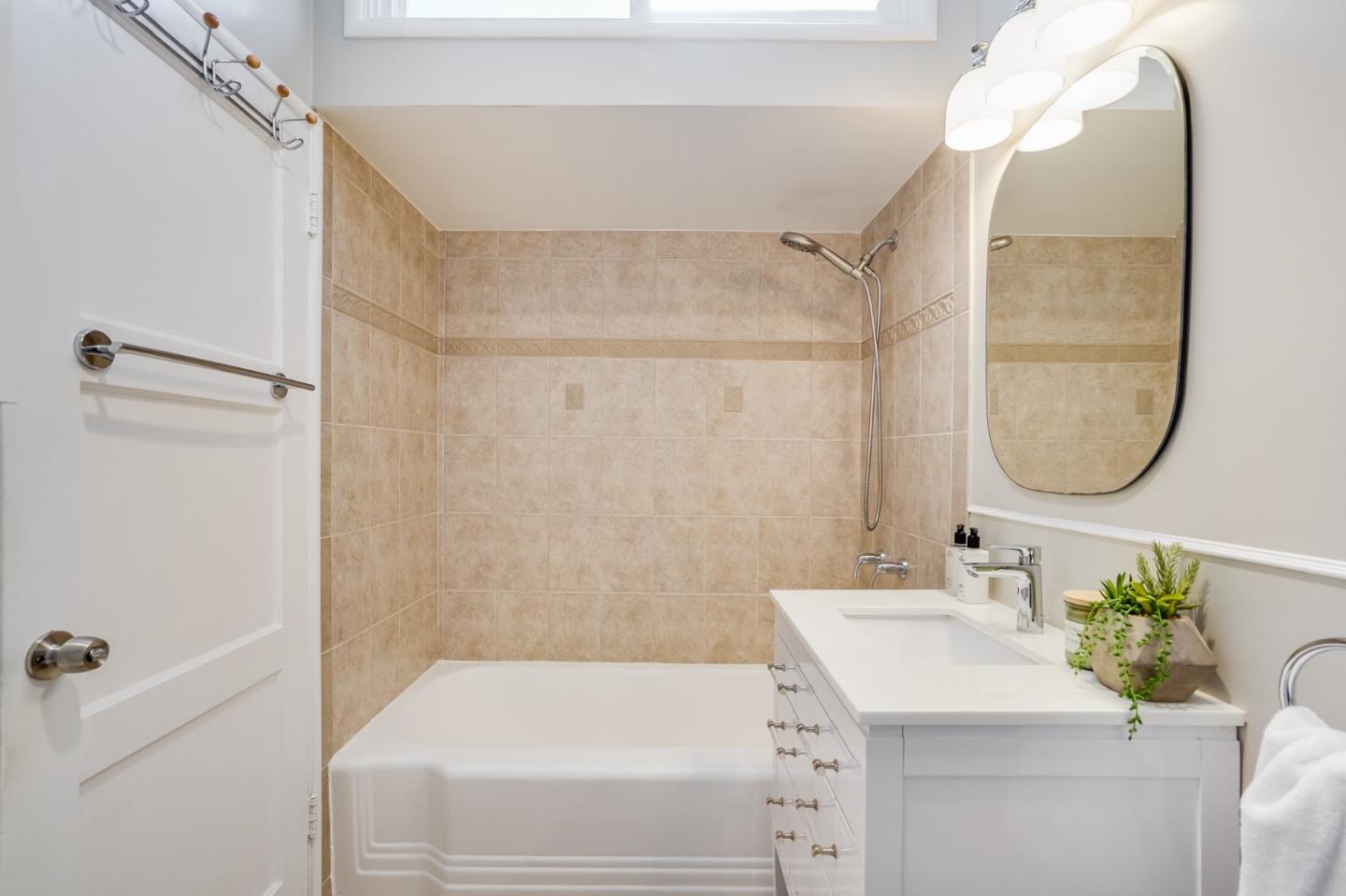 49 Sheffield Drive Daly City, CA 94015 - Photo 32 of 55 a bathroom with a sink a vanity and a mirror