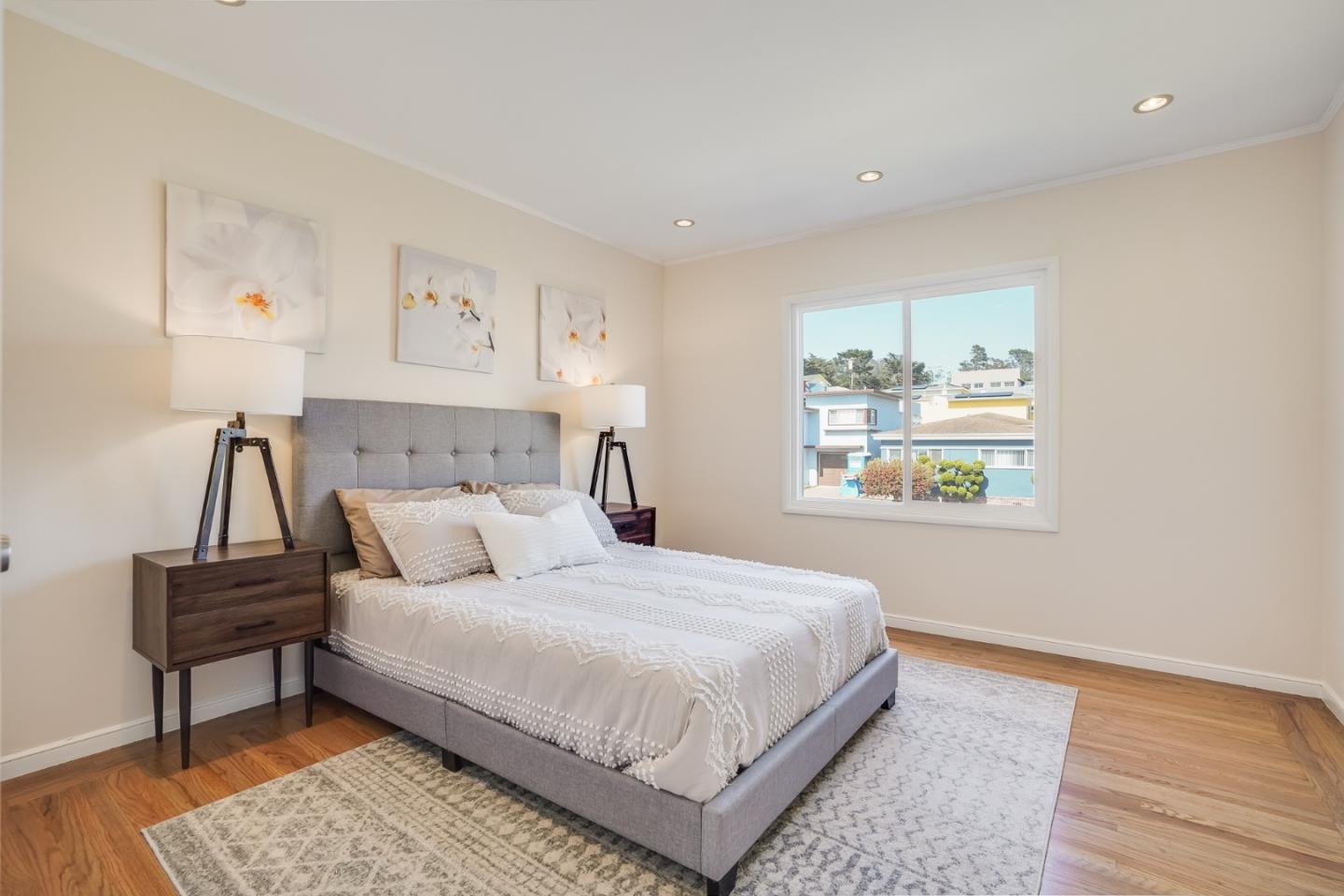 49 Sheffield Drive Daly City, CA 94015 - Photo 34 of 55 a bedroom with a bed and a painting on the wall